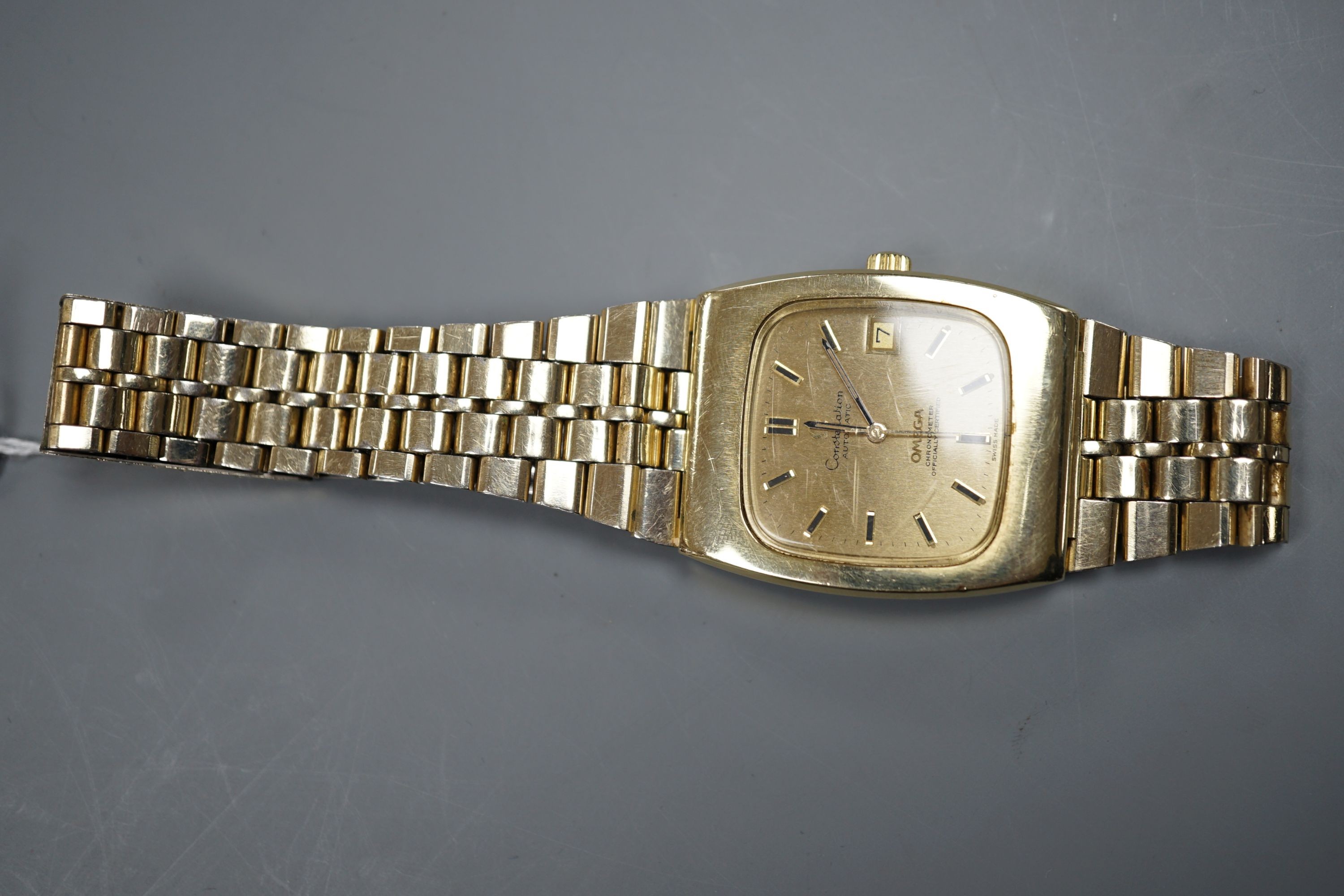 A gentleman's steel and gold plated Omega Constellation automatic wrist watch, on a steel and gold plated Omega bracelet, case diameter 34mm, no box or papers.